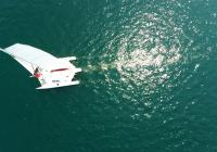 nadir aerial vertical down photo trimaran sailing yacht